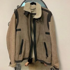 Dolce & Gabbana shearling coat with high collar.